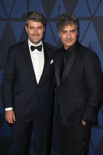 Carthew Neal and Taika Waititi attend the Academy Of Motion Picture Arts And Sciences' 11th Annual Governors Awards at The Ray Dolby Ballroom at Hollywood & Highland Center in Hollywood, California. (Photo by Kevin Winter/Getty Images)