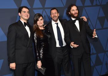 (From L-R) US actor Benny Safdie, US actress Idina Menzel, US actor Adam Sandler and US actor Josh Safdie arrive to attend the Academy Of Motion Picture Arts And Sciences' 11th Annual Governors Awards at The Ray Dolby Ballroom at Hollywood & Highland Center in Hollywood, California. (Photo by Kevin Winter/Getty Images)