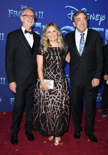 (L-R) Director Chris Buck, writer Jennifer Lee and producer Peter Del Vecho arrive for Disney's World Premiere of "Frozen 2" at the Dolby theatre in Hollywood on November 7, 2019.  (Photo by VALERIE MACON/AFP via Getty Images)