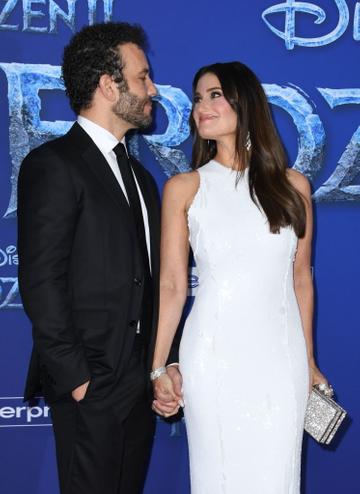 US actress/singer Idina Menzel and her husband actor Aaron Lohr arrive for Disney's World Premiere of "Frozen 2" at the Dolby theatre in Hollywood on November 7, 2019. (Photo by VALERIE MACON/AFP via Getty Images)
