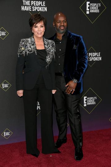 Kris Jenner and Corey Gamble attend the 2019 E! People's Choice Awards at Barker Hangar on November 10, 2019 in Santa Monica, California. (Photo by Frazer Harrison/Getty Images)