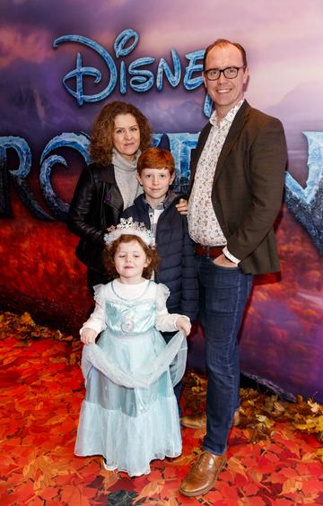 Brian Redmond with wife Jen Anna (4) and Alex (10) pictured at the special preview screening of Disney’s “Frozen 2” at the Light House Cinema, Dublin. 
Picture Andres Poveda
