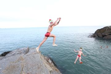 25/12/2019. Forty Foot Xmas Swim. Hundreds of people turned up at the Fortyfoot bathing spot in Sandycove, for the annual Xmas Day swim. Pictured are brothers Dean and Ryan Byrne from Newbridge at the Forty Foot Xmas Swim. Photo:RollingNews.ie