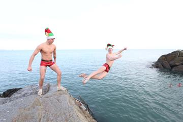 25/12/2019. Forty Foot Xmas Swim. Hundreds of people turned up at the Fortyfoot bathing spot in Sandycove, for the annual Xmas Day swim. Pictured are brothers Dean and Ryan Byrne from Newbridge at the Forty Foot Xmas Swim. Photo:RollingNews.ie