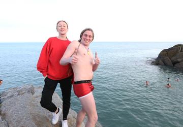 25/12/2019. Forty Foot Xmas Swim. Hundreds of people turned up at the Fortyfoot bathing spot in Sandycove, for the annual Xmas Day swim. Pictured is Irish Model January Winters with her Brother Tadhg Russell at Forty Foot Xmas Swim. Photo:RollingNews.ie
