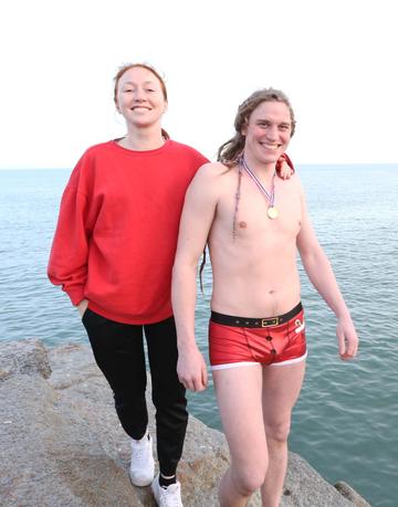 25/12/2019. Forty Foot Xmas Swim. Hundreds of people turned up at the Fortyfoot bathing spot in Sandycove, for the annual Xmas Day swim. Pictiued is Irish Model January Winters with her Brother Tadhg Russell at Forty Foot Xmas Swim. Photo:RollingNews.ie