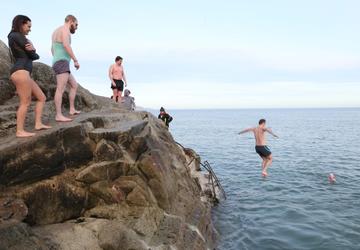 25/12/2019. Forty Foot Xmas Swim. Hundreds of people turned up at the Fortyfoot bathing spot in Sandycove, for the annual Xmas Day swim. Photo:RollingNews.ie