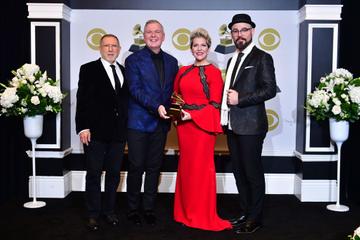(From L) Chuck Israels, Craig Terry, Joyce DiDonato and Charlie Porter pose with the award for Best Classical Solo Vocal Album for "Songplay"  in the press room during the 62nd Annual Grammy Awards on January 26, 2020, in Los Angeles. (Photo by Frederic J. Brown / AFP) (Photo by FREDERIC J. BROWN/AFP via Getty Images)