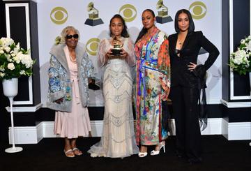 (L-R) Nipsey Hussle's grand mother Margaret Bouffe, Nipsey Hussle's daughter Emani Asghedom, Nipsey Hussle's sister Samantha Smith and Nipsey Hussle's wife Lauren London pose with the Grammy for Best Rap Song Performance in the press room during the 62nd Annual Grammy Awards on January 26, 2020, in Los Angeles. (Photo by Frederic J. Brown / AFP) (Photo by FREDERIC J. BROWN/AFP via Getty Images)