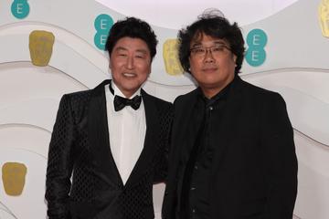 Song Kang-Ho and Bong Joon-ho arrive at the EE British Academy Film Awards 2020 at Royal Albert Hall on February 2, 2020 in London, England. (Photo by David M. Benett/Dave Benett/Getty Images)
