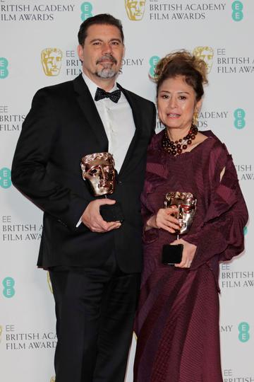 Sergio Pablos and Jinko Gotoh, winners of the Best Animation award for "Klaus", pose in the Winners Room at the EE British Academy Film Awards 2020 at Royal Albert Hall on February 2, 2020 in London, England. (Photo by David M. Benett/Dave Benett/Getty Images)