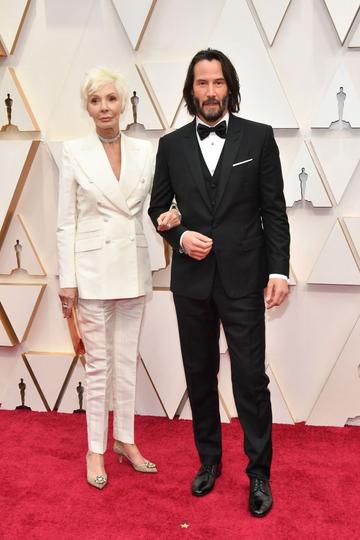 Patricia Taylor (L) and Keanu Reeves attends the 92nd Annual Academy Awards at Hollywood and Highland on February 09, 2020 in Hollywood, California. (Photo by Amy Sussman/Getty Images)