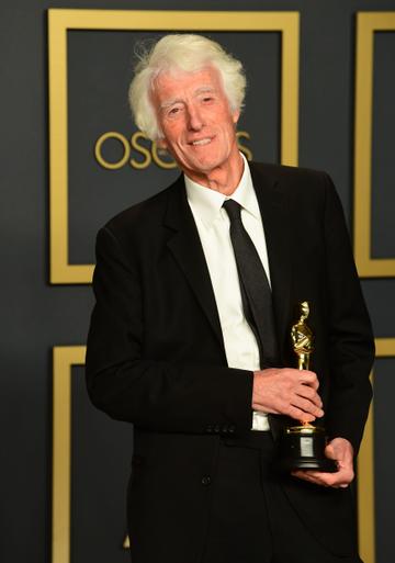 British cinematographer Roger Deakins poses in the press room with the Oscar for Best Cinematography for "1917" during the 92nd Oscars at the Dolby Theater in Hollywood, California on February 9, 2020. (Photo by FREDERIC J. BROWN / AFP) (Photo by FREDERIC J. BROWN/AFP via Getty Images)