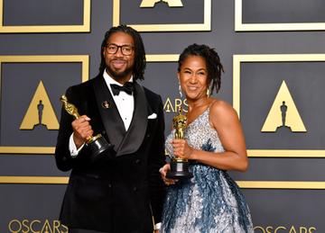 Director Matthew A. Cherry and producer Karen Rupert Toliver, winners of the Animated Short Film award for “Hair Love,” pose in the press room during the 92nd Annual Academy Awards at Hollywood and Highland on February 09, 2020 in Hollywood, California. (Photo by Amy Sussman/Getty Images)