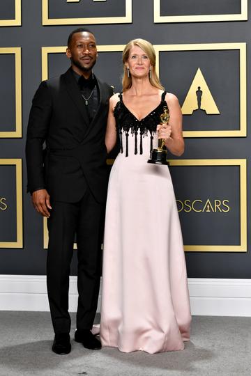 Mahershala Ali (L) with Laura Dern, winner of the Actress in a Supporting Role award for “Marriage Story,” poses in the press room during the 92nd Annual Academy Awards at Hollywood and Highland on February 09, 2020 in Hollywood, California. (Photo by Amy Sussman/Getty Images)