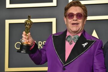 Musician Elton John, winner of the Original Song award for "(I'm Gonna) Love Me Again" from "Rocketman," poses in the press room during the 92nd Annual Academy Awards at Hollywood and Highland on February 09, 2020 in Hollywood, California. (Photo by Jeff Kravitz/FilmMagic)
