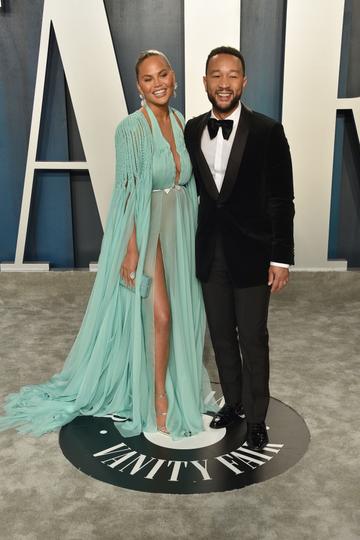 Chrissy Teigen and John Legend attend the 2020 Vanity Fair Oscar Party at Wallis Annenberg Center for the Performing Arts on February 09, 2020 in Beverly Hills, California. (Photo by David Crotty/Patrick McMullan via Getty Images)