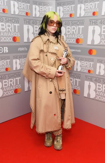 Billie Eilish, winner of the Best International Female Solo Artist award, poses in the winners room at The BRIT Awards 2020 at The O2 Arena on February 18, 2020 in London, England.  (Photo by David M. Benett/Dave Benett/Getty Images)