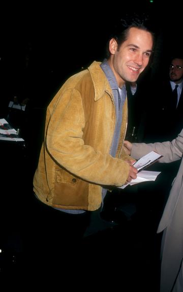 1996: Paul Rudd signs autographs outside the premiere of The Crucible. (Photo by Barry King/WireImage)