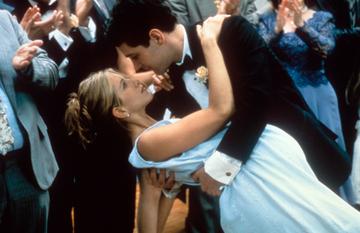 1998: Jennifer Aniston is dipped by Paul Rudd in a scene from the film 'The Object Of My Affection', 1998. (Photo by 20th Century-Fox/Getty Images)