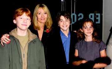 Actors Rupert Grint, Author JK Rowling, Daniel Radcliffe and Emma Watson attend the world premiere of the first Harry Potter film, 'Harry Potter and the Philosopher's Stone' at the Odeon Leicester Square, London, November 4, 2001. (Photo by Gareth Davies/Getty Images)