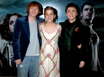 Actors Rupert Grint, Emma Watson and Daniel Radcliffe arrive at the World Premiere of "Harry Potter And The Goblet Of Fire" at the Odeon Leicester Square on November 6, 2005 in London, England.  The film is based on the fourth installment of author J.K. Rowling's novel series.  (Photo by Dave M. Benett/Getty Images)