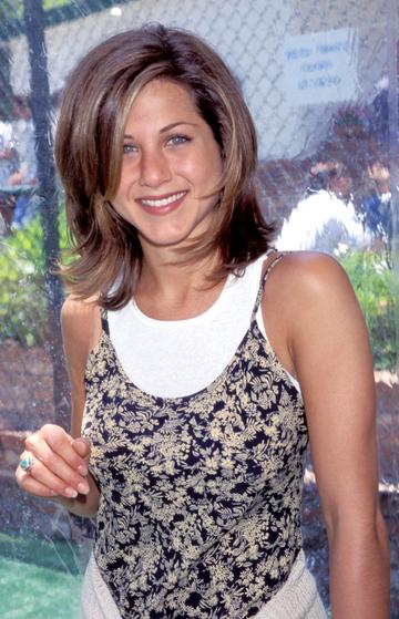 Jennifer Aniston pictured with the famous 'The Rachel' haircut at the Private Home in Los Angeles, California (Photo by Kevin Mazur/WireImage)