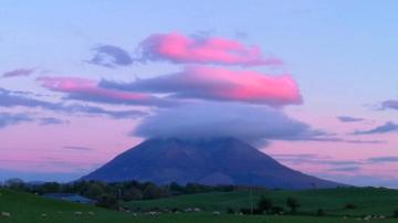 Taken in Belmullet. 
'The clouds seemed to be 2 different colors over Nephin at sunset.'
By Martin M