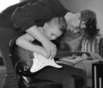 Taken in Dublin.

'Every pro was once an amateur. Big bro teaching his little bro'.

By rebecca K.