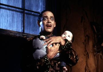 Portrayed by multiple actors over the years, Gomez Addams always appears as the caring and positive male role model in his kids lives. (Pictured is Raul Julia from Addams Family Values in 1993).
@Paramount Pictures. All Rights Reserved.