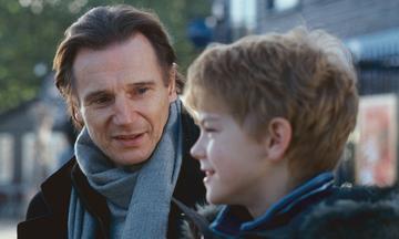 Liam Neeson makes the list for a second time with his unique role as grieving stepfather Daniel in Love Actually. @Universal Pictures. All Right Reserved.