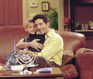 David Schwimmer took on the role as a goofy and lovable father of Ben in Friends. @Warner Bros. All Rights Reserved.