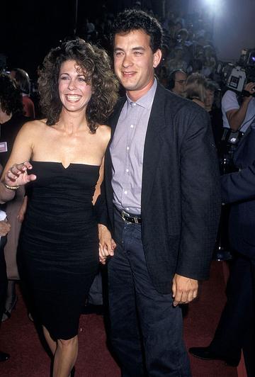 1987: Actress Rita Wilson and actor Tom Hanks attend the "Dragnet" Hollywood Premiere on June 23, 1987 at the Pacific's Paramount Theatre in Hollywood, California. (Photo by Ron Galella, Ltd./Ron Galella Collection via Getty Images)
