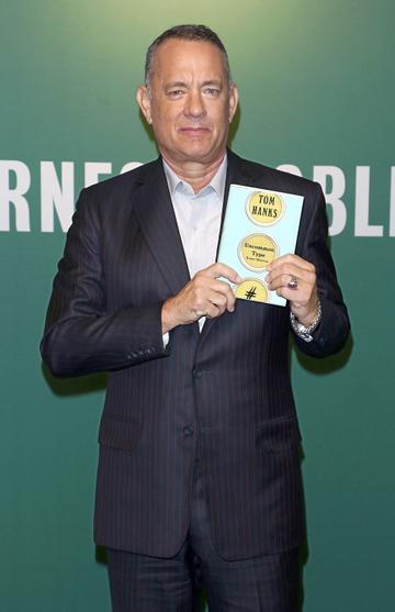 2017:  Actor Tom Hanks signs copies of his new book "Uncommon Type: Some Stories" at Barnes &amp; Noble, 5th Avenue on October 18, 2017 in New York City.  (Photo by Jim Spellman/Getty Images)