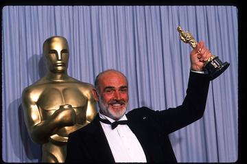 Actor Sean Connery holds up his Best Actor in a Supporting Role Oscar for "The Untouchables" at the Academy Awards April 11, 1988 in Los Angeles, CA. The Academy Awards are prizes given out annually in Hollywood for excellence in film performance and production. (Photo by John Barr/Liaison)