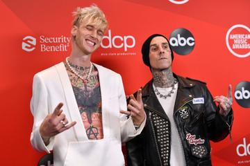 Machine Gun Kelly and Travis Barker attend the 2020 American Music Awards at Microsoft Theater on November 22, 2020 in Los Angeles, California. (Photo by Emma McIntyre /AMA2020/Getty Images for dcp)
