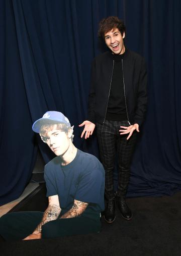 David Dobrik pictured with Justin Beiber cardboard cutout at the 2020 American Music Awards at Microsoft Theater on November 22, 2020 in Los Angeles, California. (Photo by Kevin Mazur/AMA2020/Getty Images for dcp)