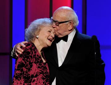 Actors Betty White (L) and Ed Asner appear onstage at the 25th Anniversary Genesis Awards at the Century Plaza Hotel on March 19, 2011 in Los Angeles, California.  (Photo by Kevin Winter/Getty Images)