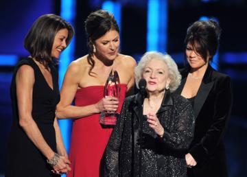 Actresses Wendie Malick, Jane Leeves, Betty White and Valerie Bertinelli, winners Favorite Cable TV Comedy for "Hot in Cleveland," speak onstage at the 2012 People's Choice Awards at Nokia Theatre L.A. Live on January 11, 2012 in Los Angeles, California.  (Photo by Kevin Winter/Getty Images)