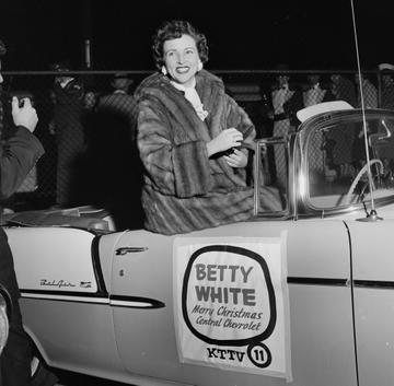 Actress Betty White is honored as she rides in a Chevrolet in the Chirstmas Parade in Los Angeles,CA. (Photo by Earl Leaf/Michael Ochs Archives/Getty Images)