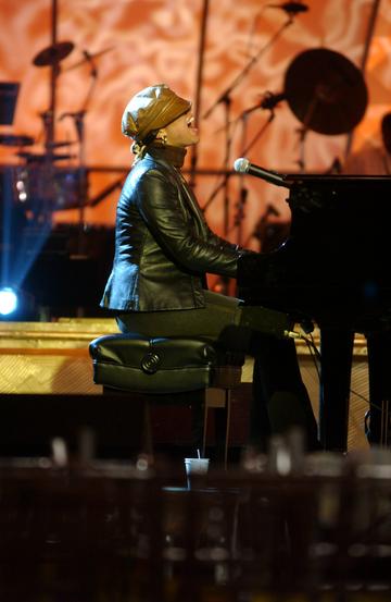 2003: Alicia Keys performs during rehearsals for the 2003 BET Walk of Fame to Honor Aretha Franklin at the BET headquarters Studio II  in Washington, DC. (Photo by Stephen J. Boitano/LightRocket via Getty Images)