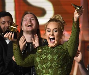 Adele broke her Album of the Year award on stage during The 59th GRAMMY Awards. She took the opportunity to speak of her favourite artist Beyoncé, saying “I can’t possibly accept this award, and I’m very humbled, and I’m very grateful and gracious, but the artist of my life is Beyoncé.” Rumour has it that Adele broke the award in two to share the honour with Beyoncé, now that's friendship!

(Photo by Kevork Djansezian/Getty Images)