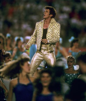 Elvis impersonator 'Elvis Presto' performs during the halftime extravaganza of the San Francisco 49ers 20-16 victory over the Cincinnati Bengals in Super Bowl XXIII on January 22, 1989 at Joe Robbie Stadium in Miami, Florida. (Photo by Rob Brown/Getty Images)