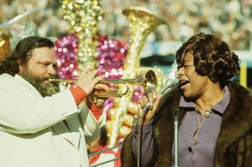 Ella Fitzgerald sings while Al Hirt plays the trumpet during the half-time show at the 1972 Superbowl. (Photo by Jerry Cooke/Corbis via Getty Images)