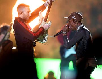 Adam Levine of Maroon 5 (L) and Travis Scott perform during the Pepsi Super Bowl LIII Halftime Show at Mercedes-Benz Stadium on February 3, 2019 in Atlanta, Georgia.  (Photo by Kevin Winter/Getty Images)