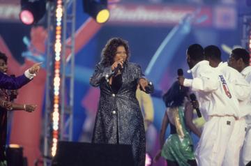 Queen Latifah (Dana Owens) performs at Halftime of the game between the Green Bay Packers and the Denver Broncos at Super Bowl 32 at Qualcomm Stadium on January 25, 1998. (Photo by Al Pereira/Getty Images/MIchael Ochs Archives)