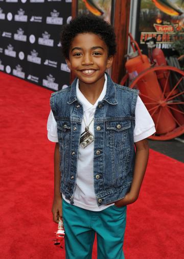 2014: Miles Brown stars as third oldest child Jack Johnson. 

(Photo by Kevin Winter/Getty Images)