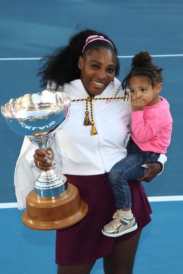 Serena Williams of the USA holds her daughter Alexis Olympia with the trophy following the Women's Final between Serena Williams and Jessica Pegula of the USA on day seven of the 2020 Women's ASB Classic at ASB Tennis Centre on January 12, 2020 in Auckland, New Zealand. (Photo by Phil Walter/Getty Images)