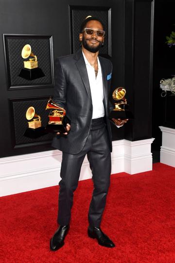 Kaytranada poses with the Grammy for Best Dance/Electronic Album and Best Dance Recording in the media room during the 63rd Annual GRAMMY Awards at Los Angeles Convention Center on March 14, 2021 in Los Angeles, California. (Photo by Kevin Mazur/Getty Images for The Recording Academy )
