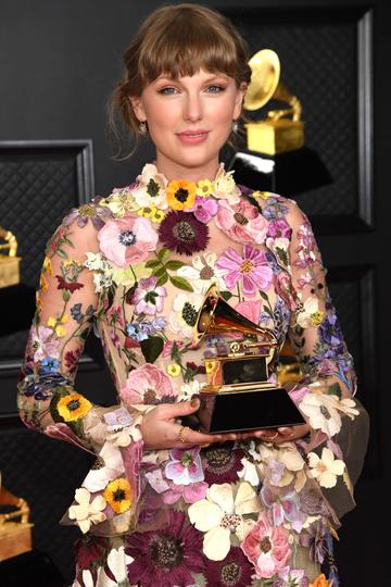 Taylor Swift, winner of the Album of the Year award for ‘Folklore,’ poses in the media room during the 63rd Annual GRAMMY Awards at Los Angeles Convention Center on March 14, 2021 in Los Angeles, California. (Photo by Kevin Mazur/Getty Images for The Recording Academy )